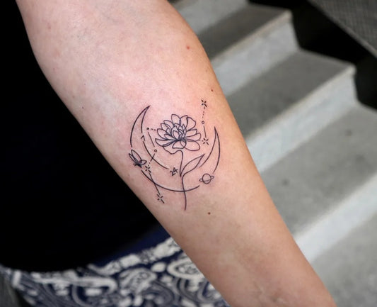 Small Fine Line Moon and Flower Tattoo on Women Forearm by @rolypolyc