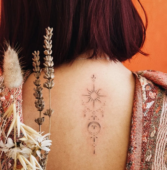 Small Fine Line Moon and Sun Mandala Tattoo on Women Back by @lunae.magic