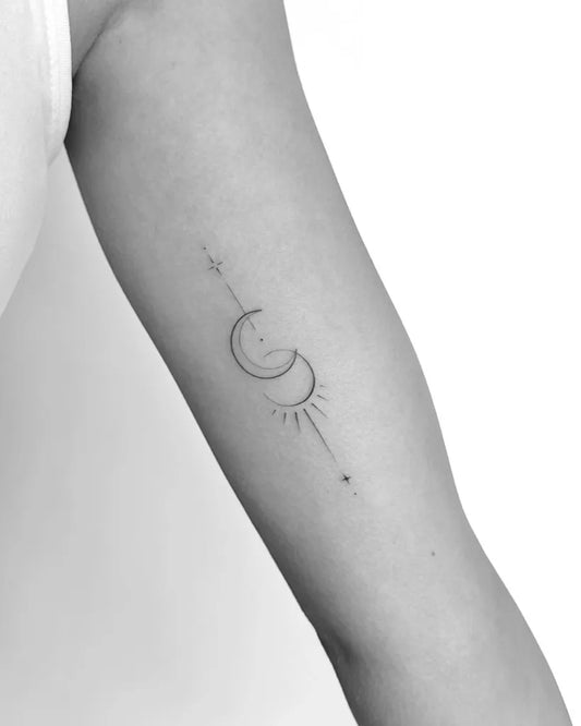 Small Fine Line Moon and Sun Tattoo on Women Arm by @mrs.tattoo_