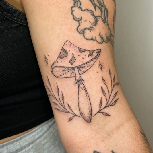 Small Fine Line Mushroom with Vines and Dots on Women Arm Tattoo by @tinytattooist