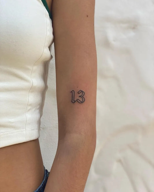 Small Fine Line Number 13 Tattoo on Women Arm by @tatts.mo