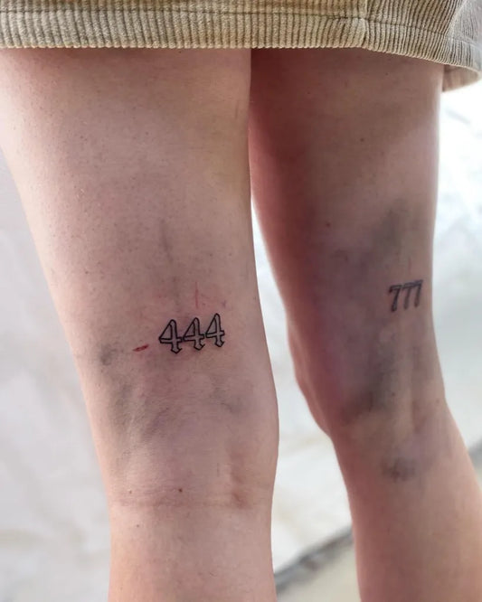 Small Fine Line Numbers 444 and 777 Tattoo on Women Thigh by @tatts.mo