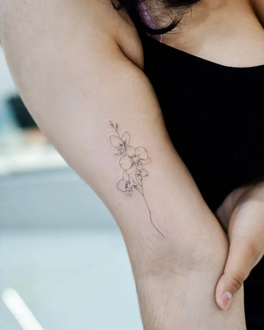 Small Fine Line Orchid Flowers Tattoo on Women Arm by @baronart_helen