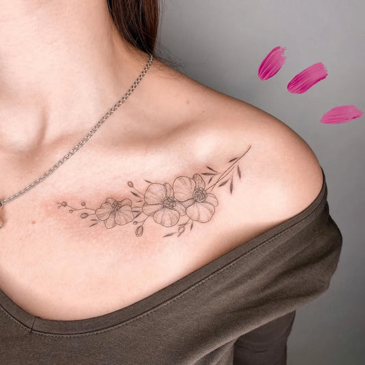 Small Fine Line Orchid Flowers Tattoo on Women Shoulder by @irena.thecomet