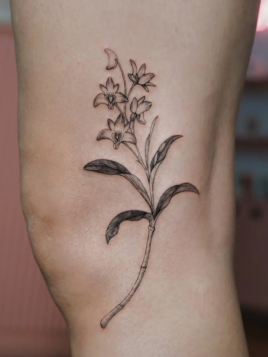 Small Fine Line Orchid Tattoo on Women Leg by @mishbae