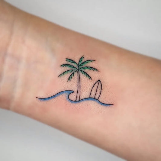 Small Fine Line Palm Tree Surfboard Wave Tattoo on Women Wrist by @taeri_tattoo
