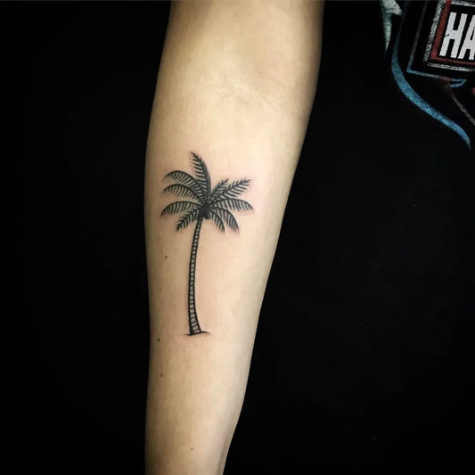 Small Fine Line Palm Tree Tattoo on Women Forearm by @barbielongfox