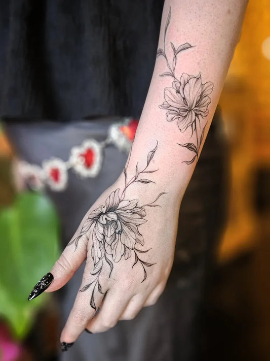 Small Fine Line Peony Flowers and Vines on Women Forearm Tattoo by @ellotattoo