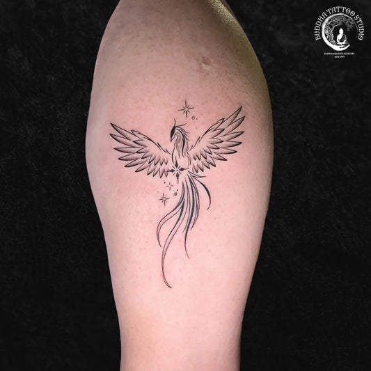 Small Fine Line Phoenix with Stars on Men Arm Tattoo by @buddha_tattoo_studiohyd