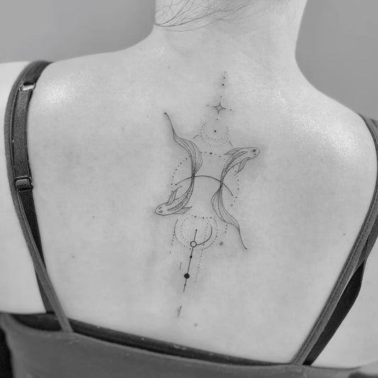 Small Fine Line Pisces Symbol with Fish Tattoo on Women Back by @miss__jsl