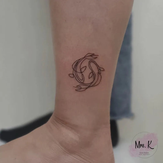 Small Fine Line Pisces Tattoo on Women Ankle by @mrs_k_tatts