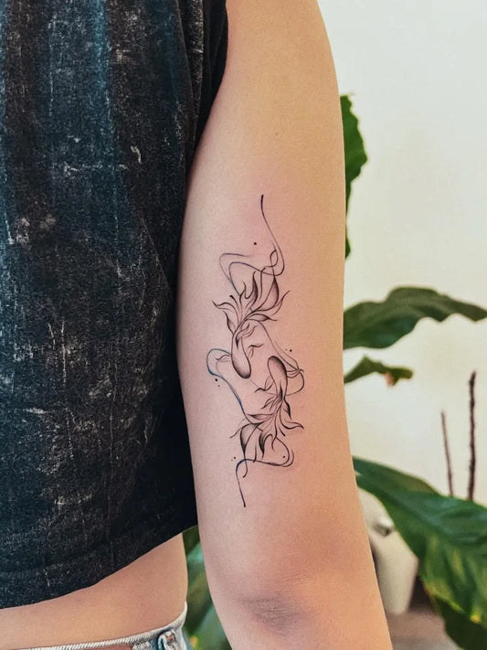 Small Fine Line Pisces Tattoo on Women Arm by @joeytatt2