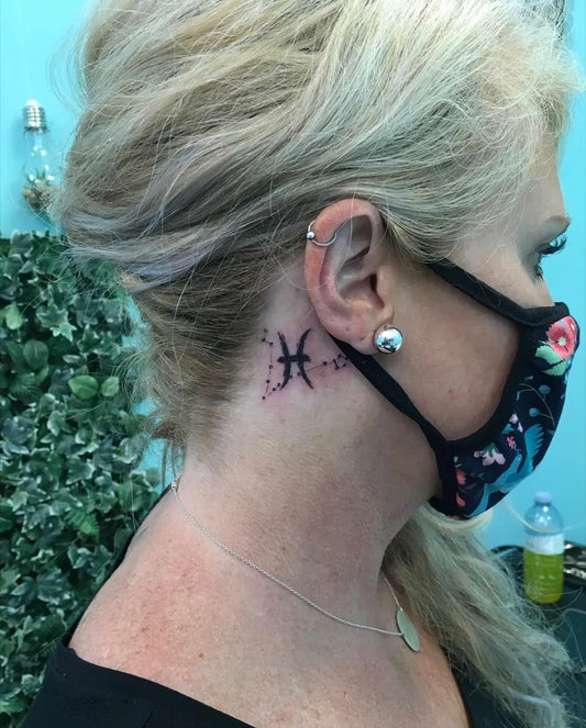 Small Fine Line Pisces Tattoo on Women Neck by @ola.tattoos