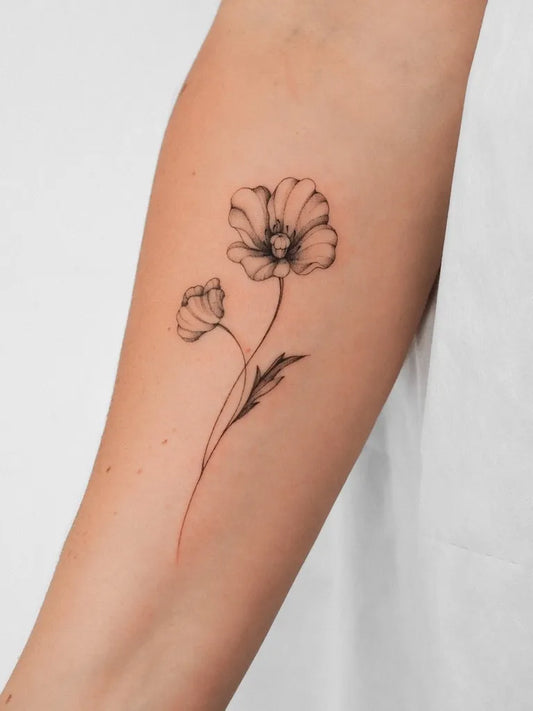 Small Fine Line Poppy Flower Tattoo on Women Arm by @natalia_musiol