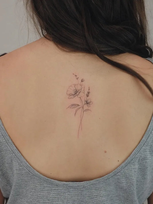 Small Fine Line Poppy and Lavender Tattoo on Women Back by @ally.tattooartist