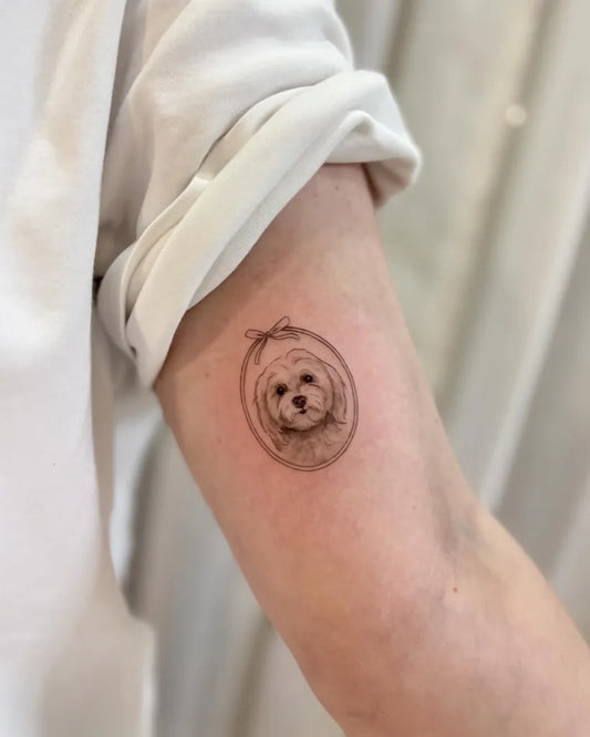 Small Fine Line Portrait Frame Dog Tattoo on Women Arm by @muranabi.ink