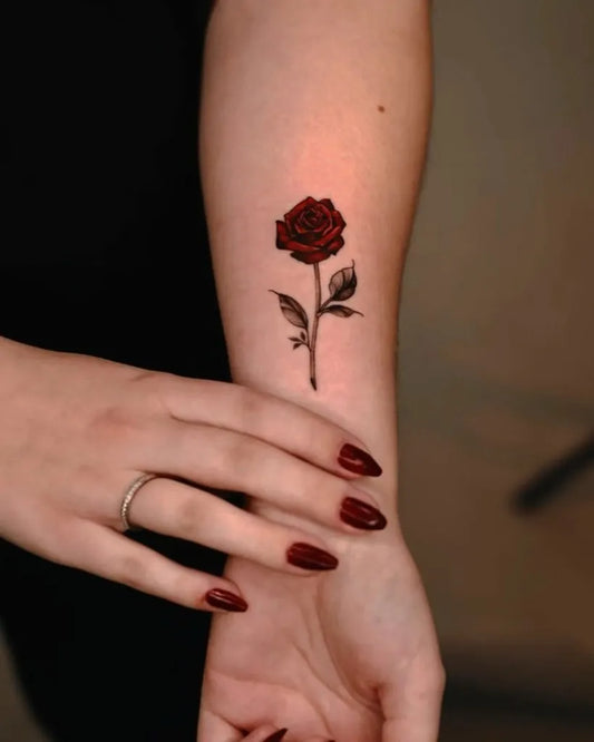 Small Fine Line Red Rose on Women Arm Tattoo by @amiri_theartist