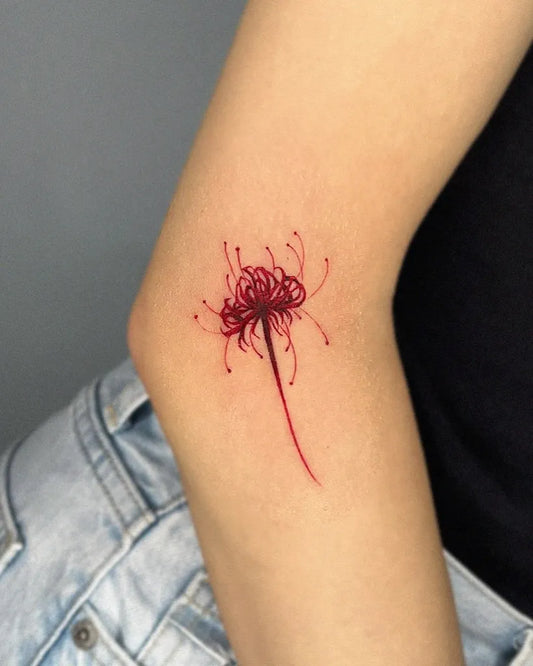 Small Fine Line Red Spider Lily Tattoo on Women Elbow by @tattooist_hoji