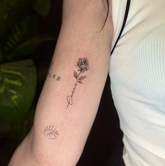 Small Fine Line Rose Name Eye on Women Arm Tattoo by @tubaabaysal
