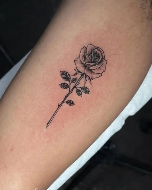 Small Fine Line Rose on Women Arm Tattoo by @edocinktattoostudio