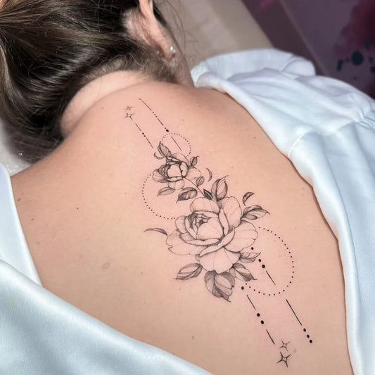 Small Fine Line Roses and Geometric Lines on Women Back Tattoo by @vivicandidotattooist