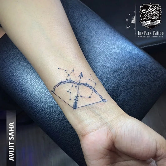 Small Fine Line Sagittarius Constellation Arrow Tattoo on Women Wrist by @fdavijit_saha