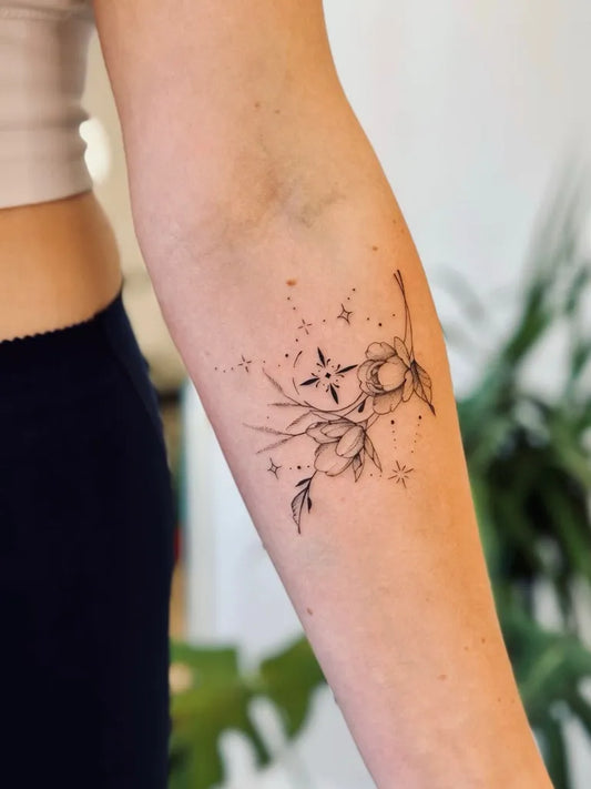 Small Fine Line Sagittarius Flowers Tattoo on Women Forearm by @carolinastattoo