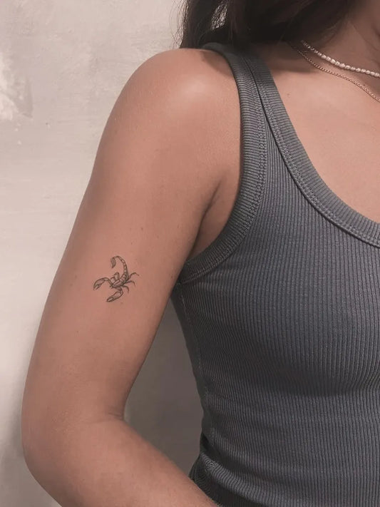 Small Fine Line Scorpion on Women Arm Tattoo by @elementalfinelinetattoo