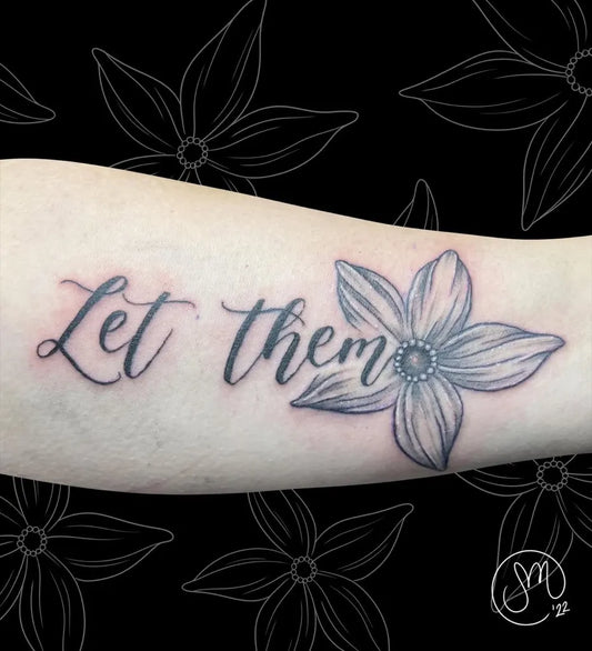 Small Fine Line Script Let Them Flower on Women Forearm Tattoo by @inkedbysky