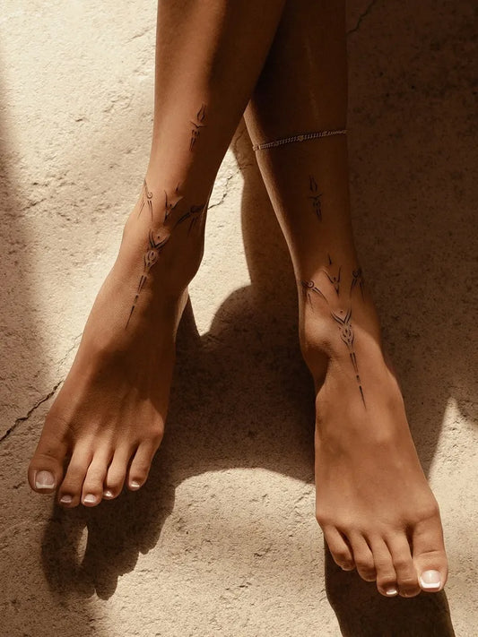 Small Fine Line Script and Symbols Tattoo on Women Ankle by @sue.real