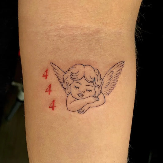 Small Fine Line Sleeping Cherub with 444 on Women Arm Tattoo by @geeroetattoo