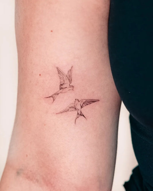 Small Fine Line Sparrows Tattoo on Women Arm by @amar.inks