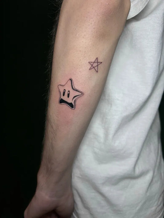 Small Fine Line Star Koopa Tattoo on Men Arm by @sahar_tattooist