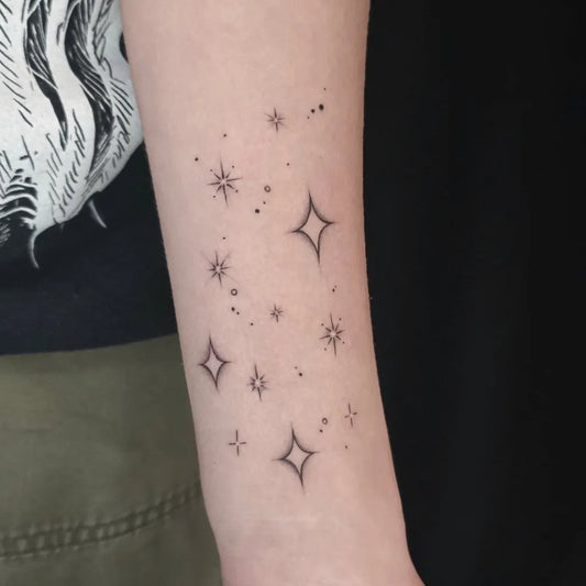 Small Fine Line Star Tattoo on Women Arm by @terra._.ink