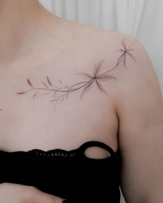 Small Fine Line Star and Leaves Tattoo on Women Shoulder by @giftonecore
