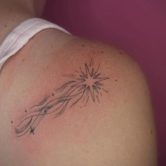 Small Fine Line Star with Trails Tattoo on Men Shoulder by @roses.in.gloom