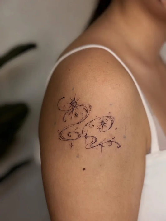 Small Fine Line Stars and Spirals Tattoo on Women Shoulder by @qiongyu_art
