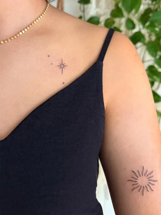 Small Fine Line Stars and Sun on Women Shoulder Tattoo by @tubitta_