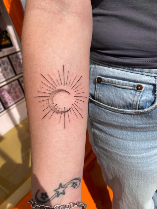 Small Fine Line Sun Moon on Women Forearm Tattoo by @jadeharristattoo