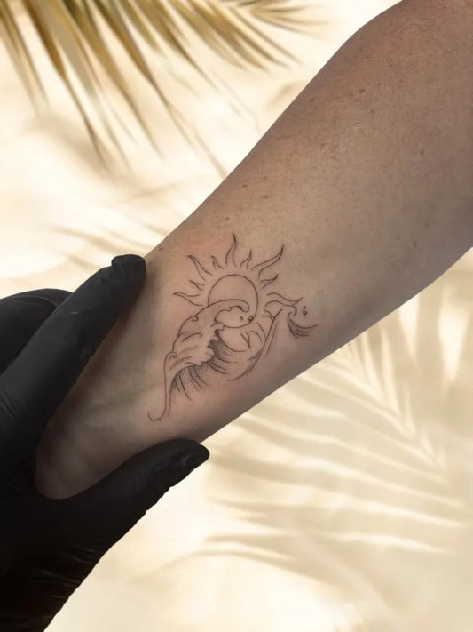 Small Fine Line Sun Wave Tattoo on Women Wrist by @inkwave.tattoo.fuerteventura