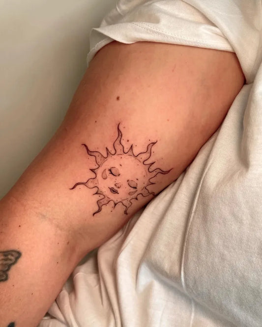 Small Fine Line Sun on Women Arm Tattoo by @minuetta.ttt