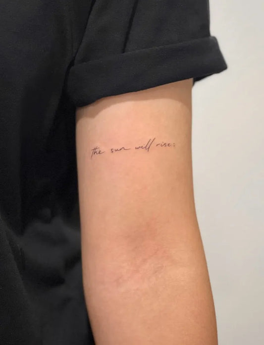 Small Fine Line Sunrise Script on Women Arm Tattoo by @karntattooer