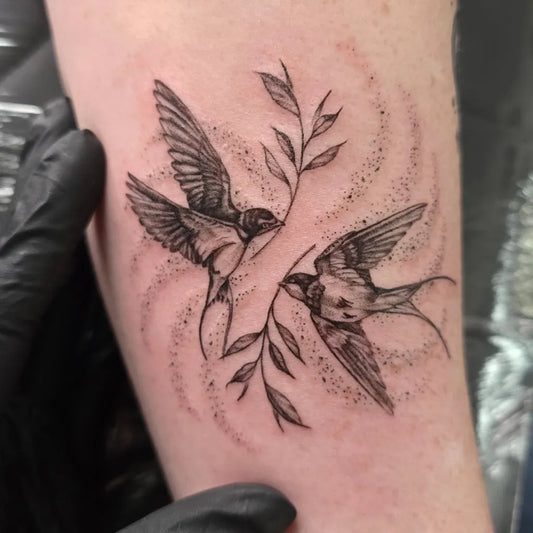 Small Fine Line Swallow and Branches Tattoo on Women Arm by @aj.tattooo