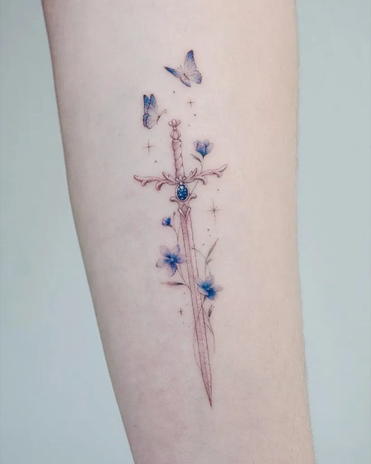 Small Fine Line Sword and Butterflies on Women Arm Tattoo by @peppa_tattoos