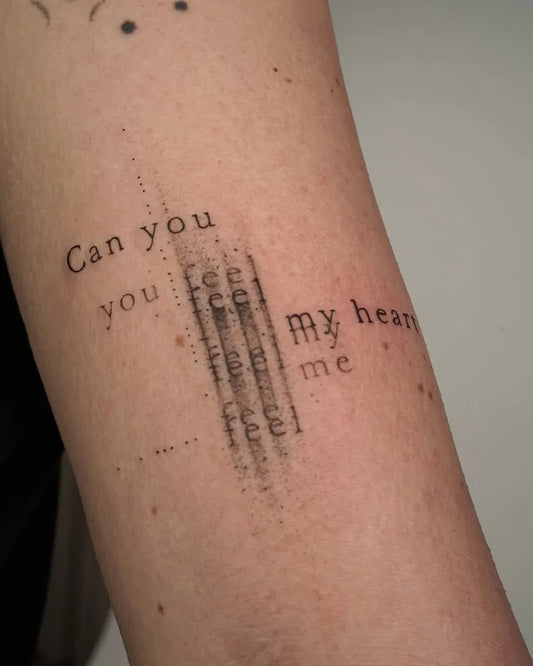Small Fine Line Text Heart on Women Arm Tattoo by @hood.seven
