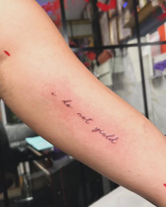 Small Fine Line Text Quote Tattoo on Women Arm by @btn_tattoos