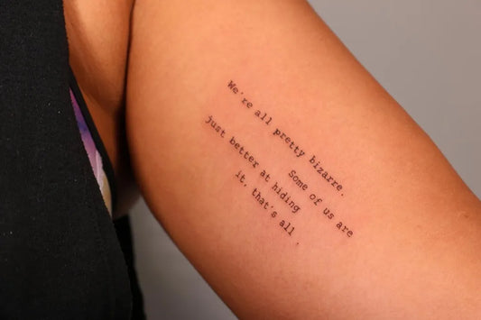 Small Fine Line Text Quote Tattoo on Women Arm by @ninistattoos