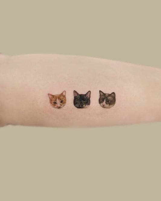 Small Fine Line Three Cats Tattoo on Women Forearm by @tattoo.pencil