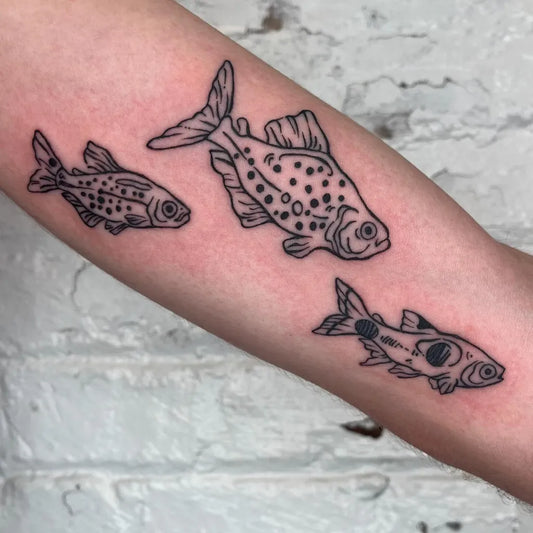Small Fine Line Three Spotted Fish Tattoo on Women Arm by @twofacedserpent
