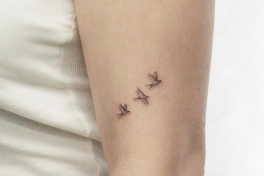 Small Fine Line Three Swallow Tattoo on Women Arm by @sou_tattooer
